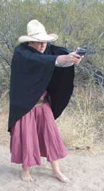 Cowboy Action Ponch shown by Half-A-Hand Henri shooting Traditional style.
